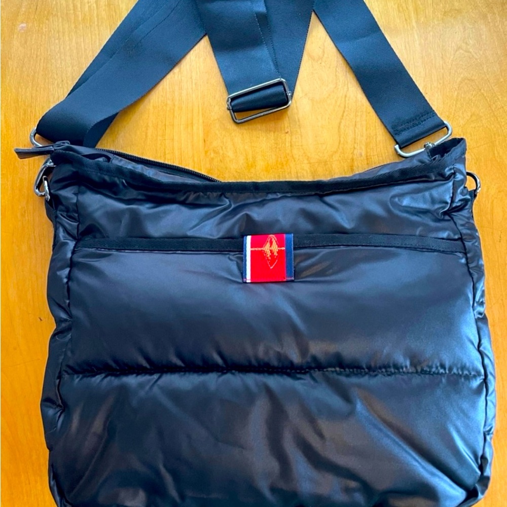 Pretty Rugged Black Puffer Bag.